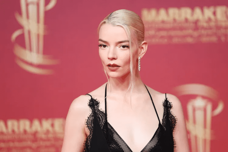 Anya Taylor‑Joy black lace naked dress, Anya Taylor‑Joy exposed bra Tom Ford gown, Anya Taylor‑Joy Marrakech Film Festival closing ceremony, Anya Taylor‑Joy jury member fashion look, Anya Taylor‑Joy plunging neckline sheer slipdress, Anya Taylor‑Joy lingerie‑as‑clothing red carpet trend, Anya Taylor‑Joy diamond earrings sleek bun style, Anya Taylor‑Joy peek‑a‑bra fashion statement, Anya Taylor‑Joy daring red carpet outfits 2025, Anya Taylor‑Joy grounded personality fashion risk