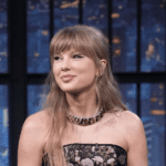 Taylor Swift micro miniskirt red tights look, Taylor Swift divisive winter fashion trend, Taylor Swift The End of an Era screening, Taylor Swift Disney+ docuseries release December 12, Taylor Swift Eras Tour behind the scenes, Taylor Swift Vancouver final show concert film, Taylor Swift bold Y2K tights fashion comeback, Taylor Swift surprise appearance December 2025, Taylor Swift Eras Tour $2 billion gross, Taylor Swift band dancers screening event