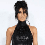 Kim Kardashian black lace bra Christmas party, Kim Kardashian skintight black dress 2025, Kim Kardashian lingerie‑style holiday look, Kim Kardashian Kate Hudson party outfit, Kim Kardashian plunging neckline gown Los Angeles, Kim Kardashian old Hollywood glam fashion, Kim Kardashian celebrity holiday party style, Kim Kardashian daring fashion risks 2025, Kim Kardashian hourglass figure black dress, Kim Kardashian festive celebrity fashion moments