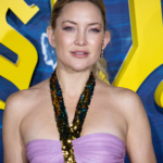 Kate Hudson Gotham Awards 2025 silk dress, Kate Hudson braless Ralph Lauren gown, Kate Hudson side boob slip dress look, Kate Hudson Gen Z wet hair trend, Kate Hudson minimalist red carpet fashion, Kate Hudson and Hugh Jackman Song Sung Blue, Kate Hudson daring fashion choices 2025, Kate Hudson sheer electric blue gown Berlin, Kate Hudson timeless chic style evolution, Kate Hudson Gotham Awards red carpet appearance