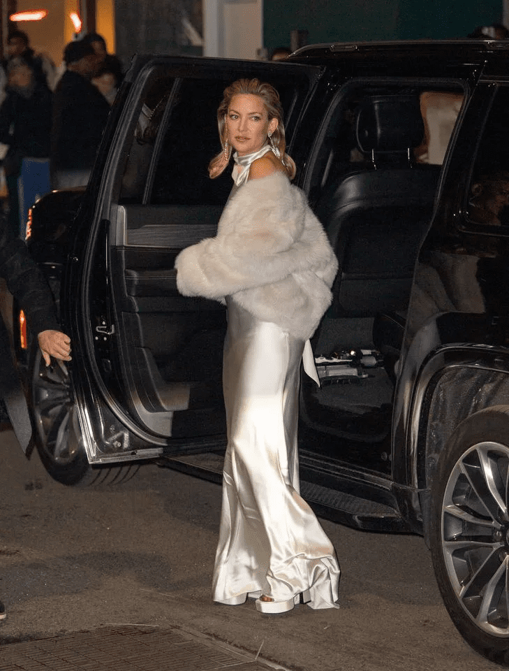 Kate Hudson Gotham Awards 2025 silk dress, Kate Hudson braless Ralph Lauren gown, Kate Hudson side boob slip dress look, Kate Hudson Gen Z wet hair trend, Kate Hudson minimalist red carpet fashion, Kate Hudson and Hugh Jackman Song Sung Blue, Kate Hudson daring fashion choices 2025, Kate Hudson sheer electric blue gown Berlin, Kate Hudson timeless chic style evolution, Kate Hudson Gotham Awards red carpet appearance