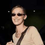 Bella Hadid bra strap trend, Bella Hadid bootcut jeans look, Bella Hadid nude Valentino top, Bella Hadid Coach Tabby bag, Bella Hadid daring fashion 2026, Bella Hadid visible bra straps, Bella Hadid street style Los Angeles, Bella Hadid Ryan Murphy The Beauty series, Bella Hadid acting career, Bella Hadid viral outfit