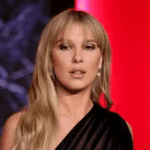 Millie Bobby Brown no‑bra shirt, Millie Bobby Brown Eleven gym outfit, Millie Bobby Brown Stranger Things finale, Millie Bobby Brown Florence by Mills fashion, Millie Bobby Brown Instagram photo dump, Millie Bobby Brown 2025 fashion highlights, Millie Bobby Brown married Jake Bongiovi, Millie Bobby Brown adopted baby girl, Millie Bobby Brown blonde hair look, Millie Bobby Brown cozy loungewear