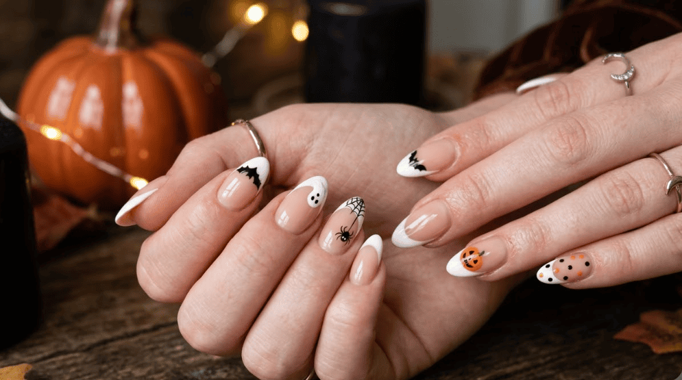 Halloween nails, spooky nail art, cute Halloween nails, pumpkin nail designs, ghost nail ideas, spiderweb manicure, black cat nails, blood drip nails, skull nail art, witch inspired nails