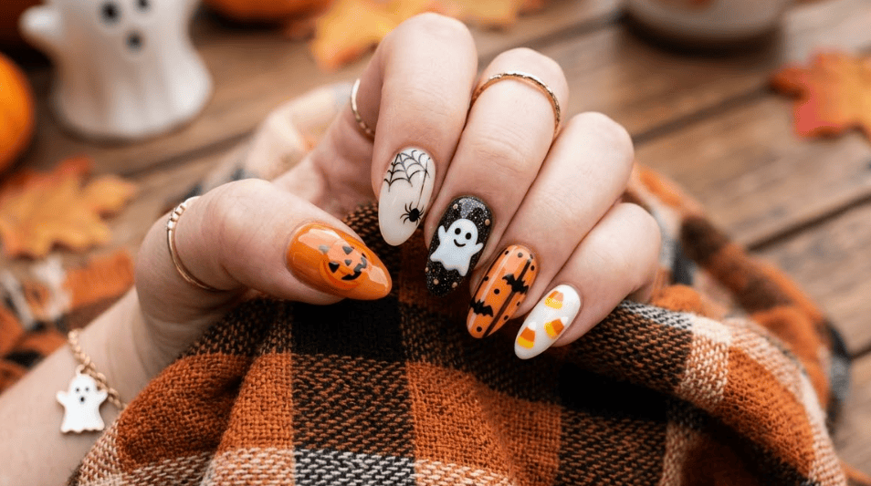 Halloween nails, spooky nail art, cute Halloween nails, pumpkin nail designs, ghost nail ideas, spiderweb manicure, black cat nails, blood drip nails, skull nail art, witch inspired nails