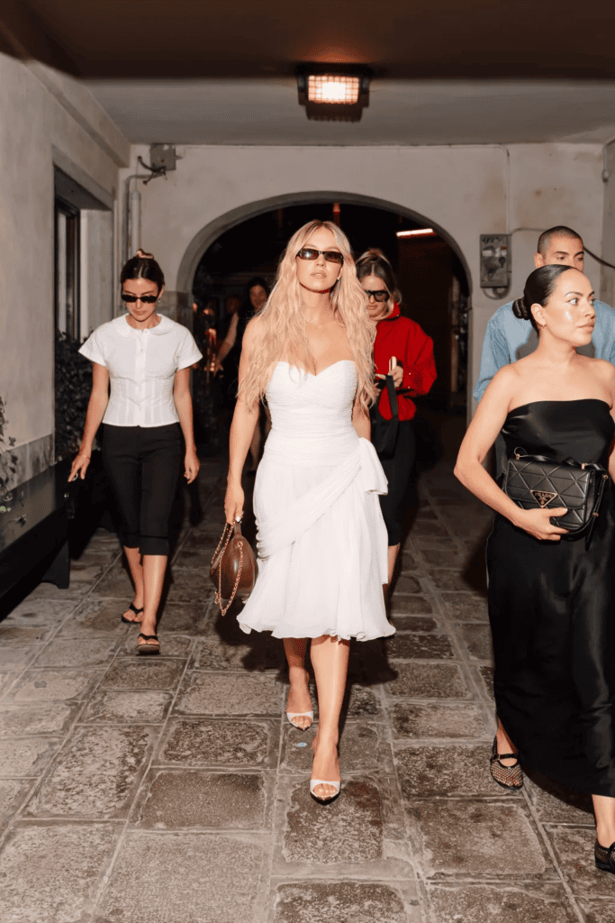 Sydney Sweeney Venice Chanel look, Sydney Sweeney strapless dress, Sydney Sweeney sunglasses at night, Armani Beauty ambassador, Sydney Sweeney Venice Film Festival, celebrity fashion Venice, trending celebrity outfits, Hollywood star style, Syrn lingerie campaign, Sydney Sweeney birthday month