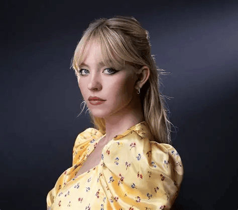 Sydney Sweeney Venice Chanel look, Sydney Sweeney strapless dress, Sydney Sweeney sunglasses at night, Armani Beauty ambassador, Sydney Sweeney Venice Film Festival, celebrity fashion Venice, trending celebrity outfits, Hollywood star style, Syrn lingerie campaign, Sydney Sweeney birthday month